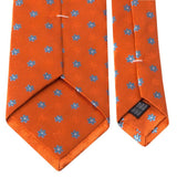 Seiden-Jacquard Krawatte in Orange mit hellblauen Blüten-Muster Rückseite