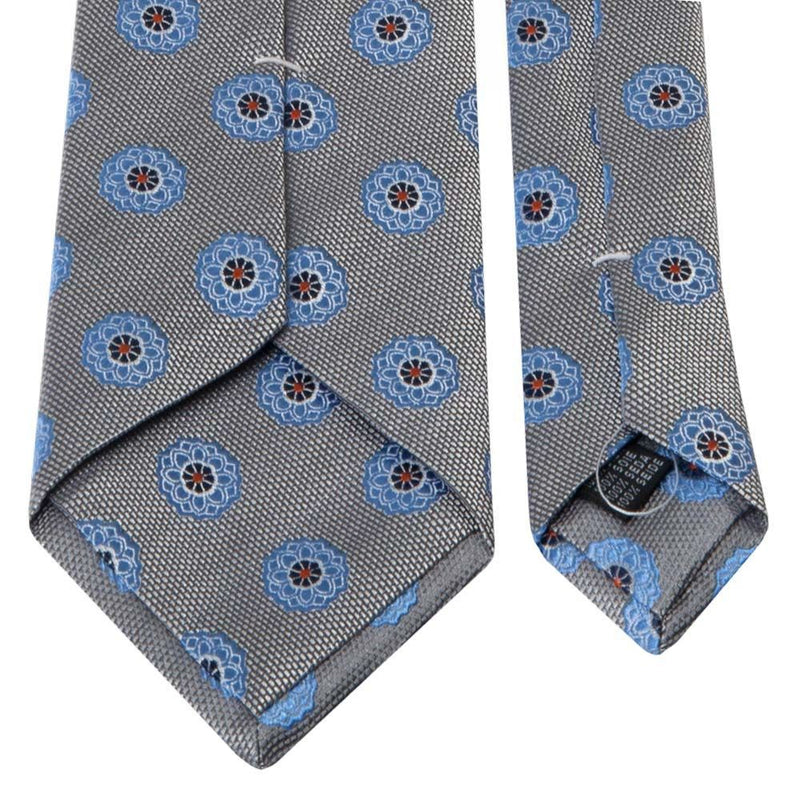 Graue Seiden-Jacquard Krawatte mit blauem Blüten-Muster von BGENTS Rückseite